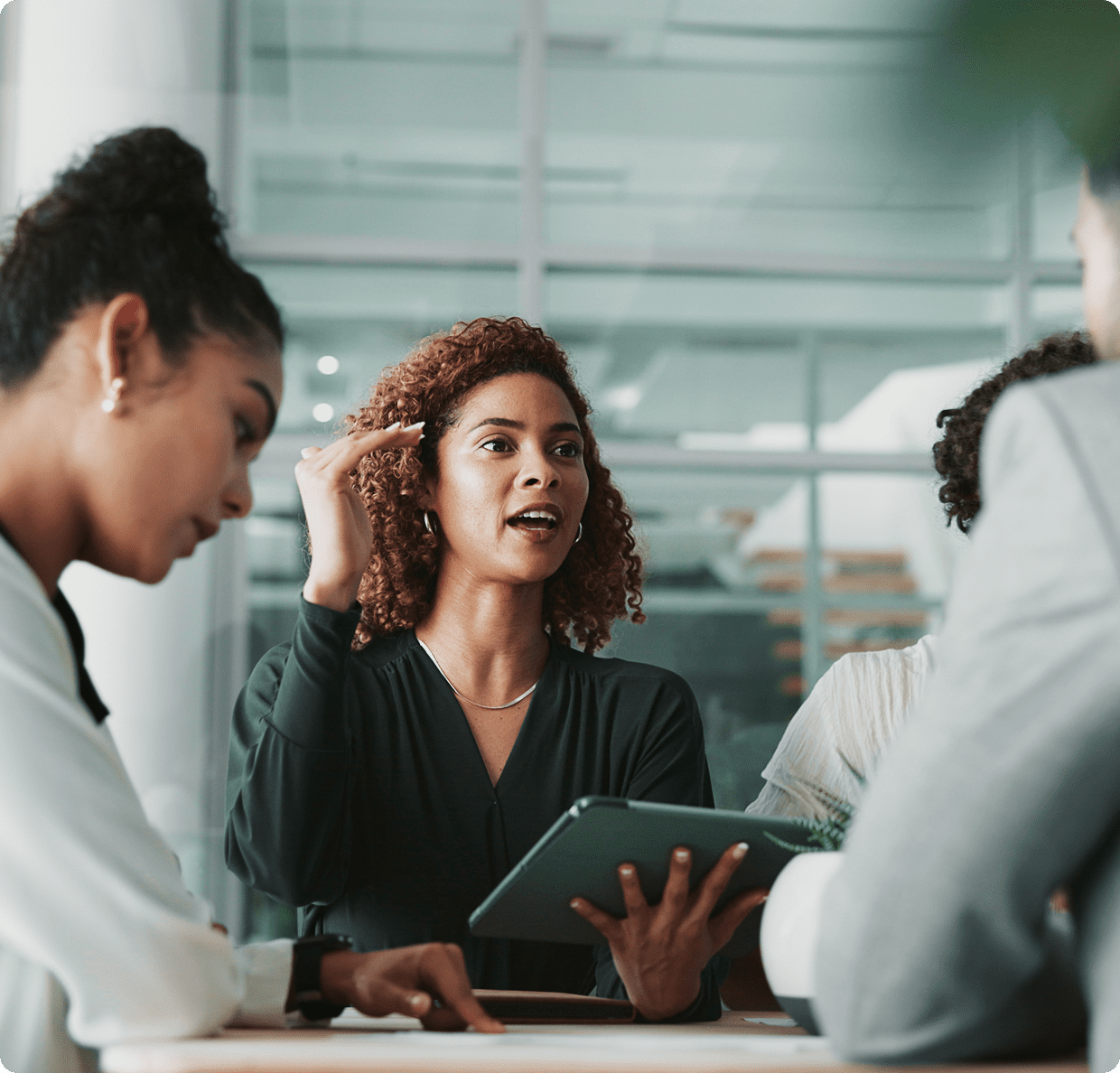 Woman leading a business meeting discussion.